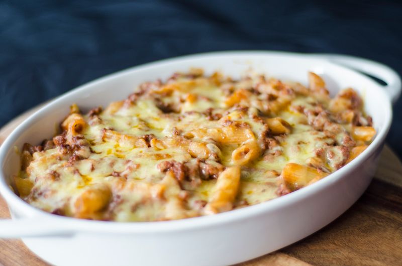 Baked penne with cheese and tomato sauce