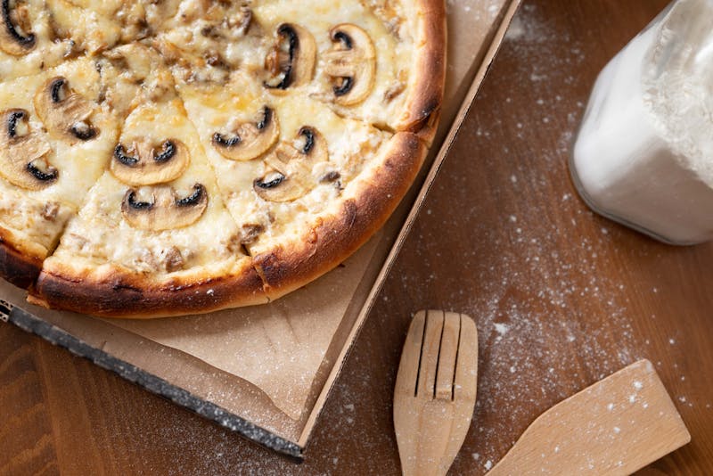Warm cinnamon dessert pizza with sweet toppings